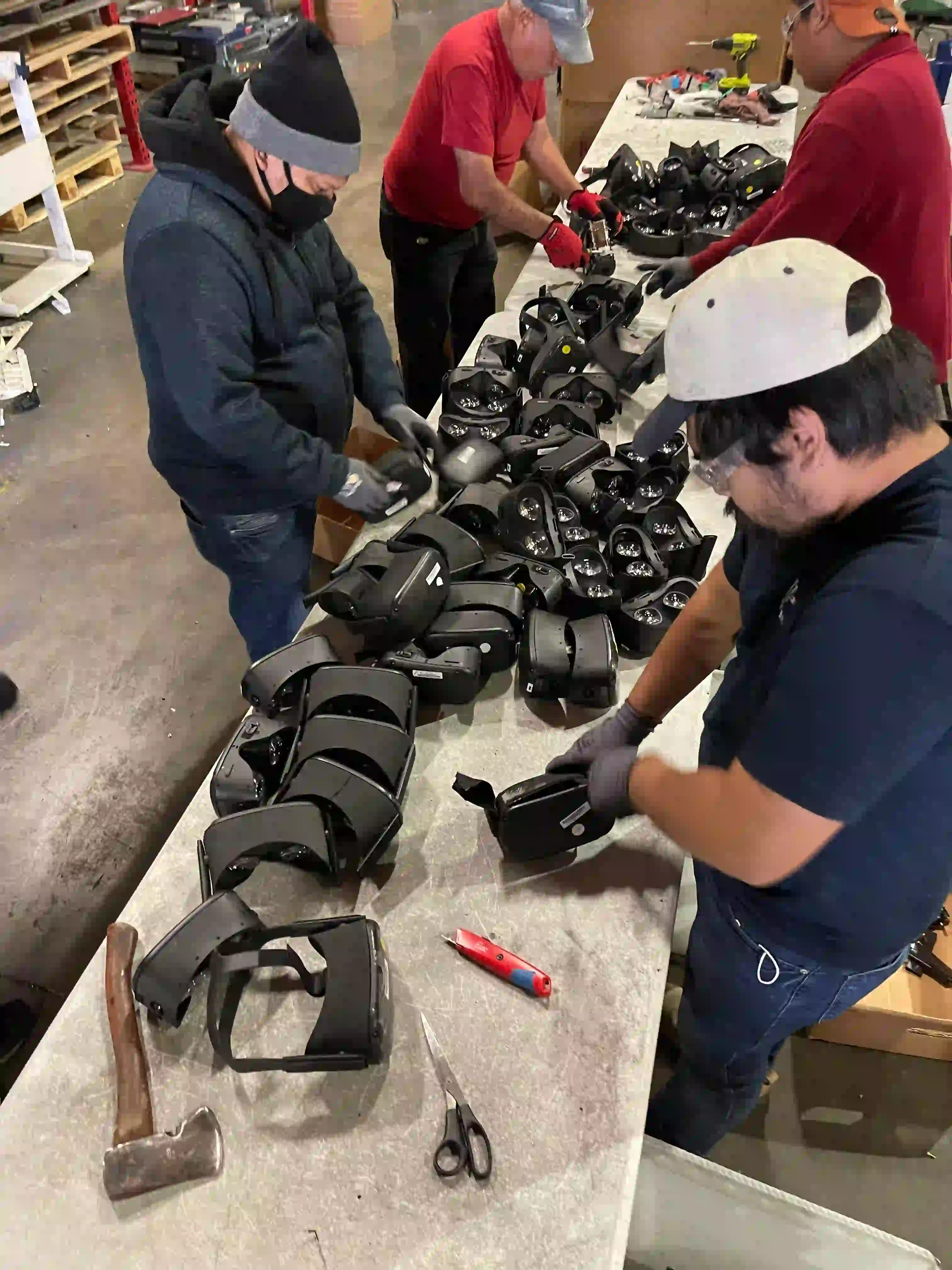 Viking Shred team members preparing electronic equipment for destruction